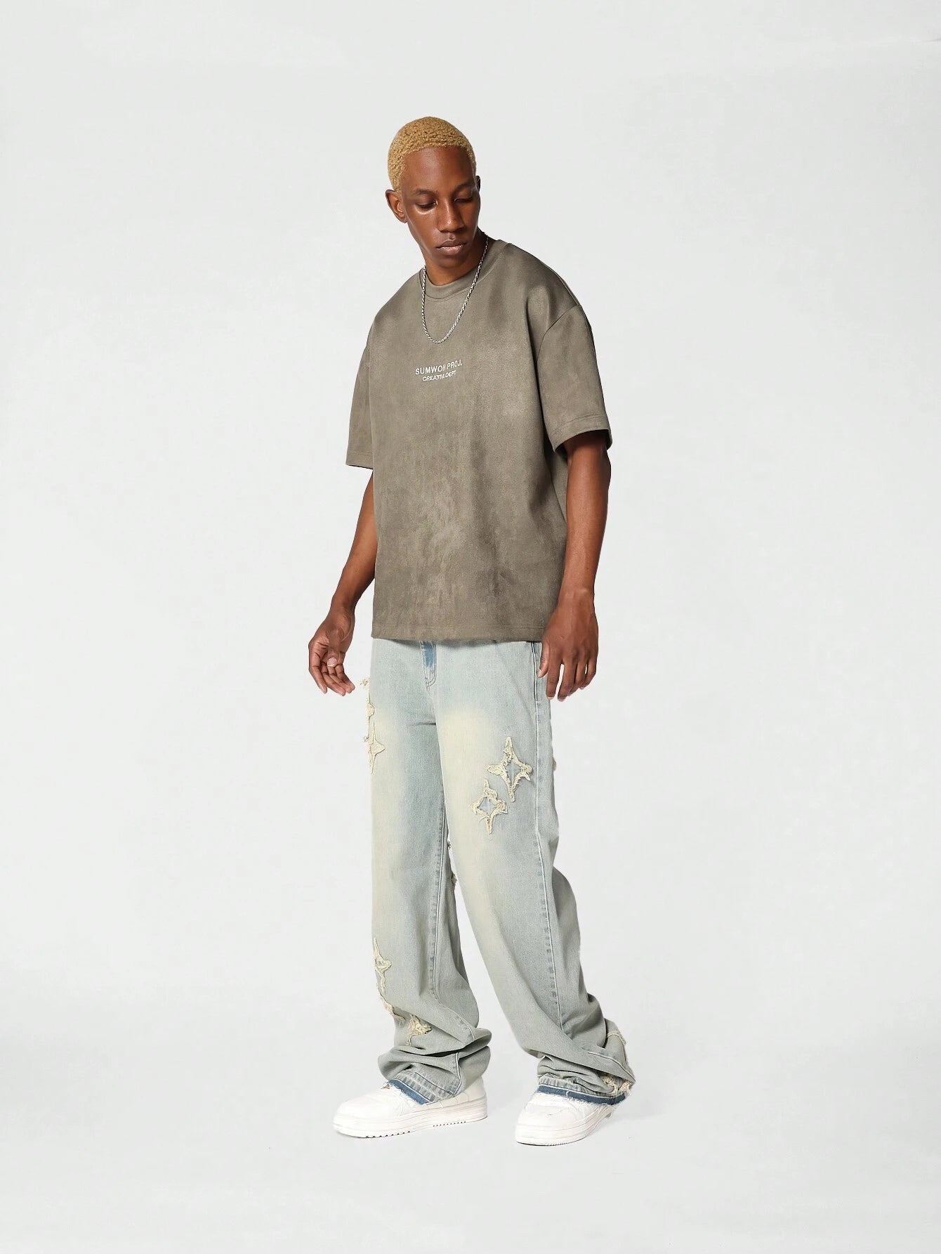 Calça Denim Solto com Aplicação Stars